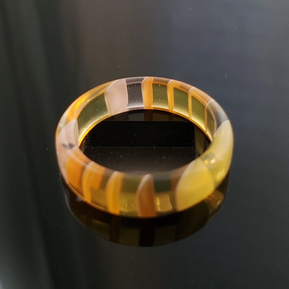 Ring with layered acrylic plastic in orange tones, band size 8